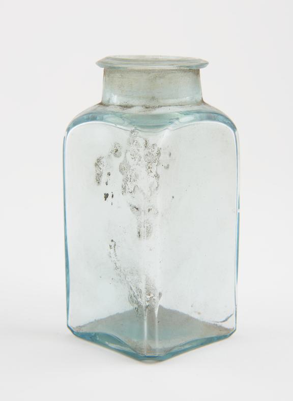 Dispensing bottle, light blue glass, empty, unlabelled, English