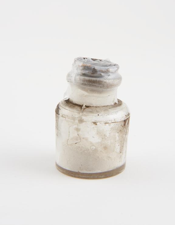 Small glass dispensing bottle, used for unidentified drug