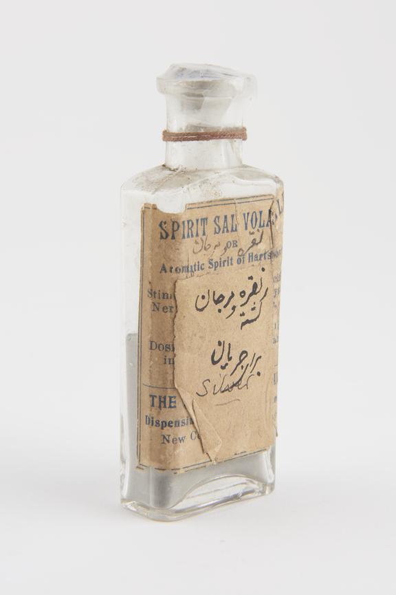 Rectangular bottle of clear glass used for spirit of sal