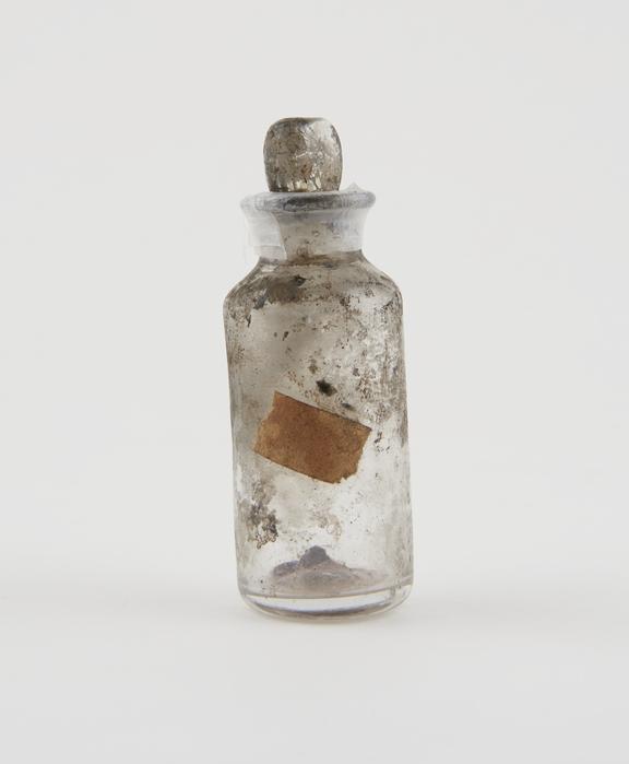 Small bottle, clear glass, trace content, English, 1840-1900