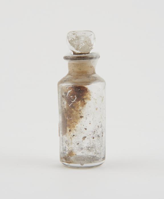 Small bottle, clear glass, trace content, English, 1840-1900