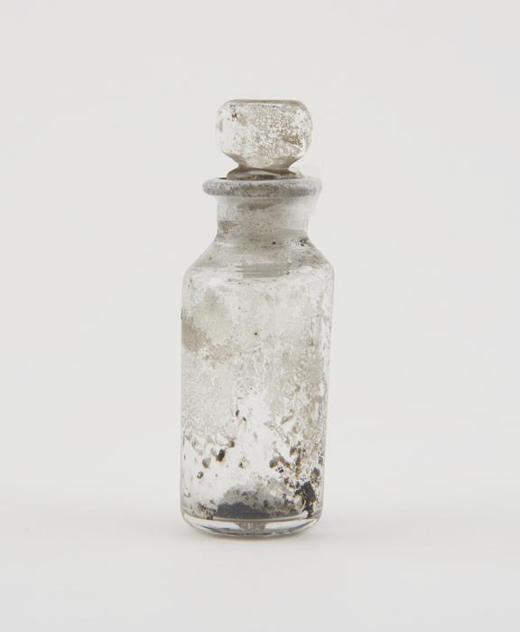 Small bottle, clear glass, trace content, English, 1840-1900