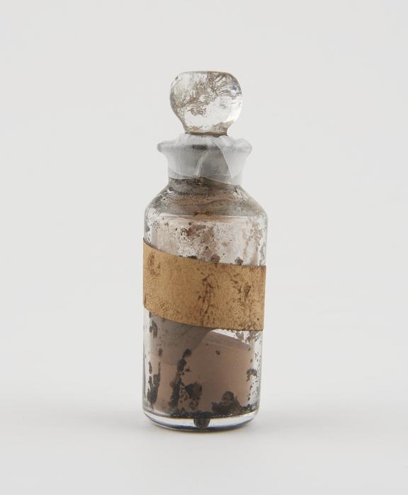 Small bottle, clear glass, with contents, English, 1840-1900