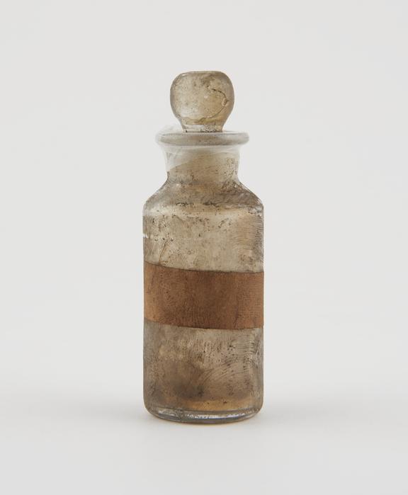 Small bottle, clear glass, trace content, English, 1840-1900