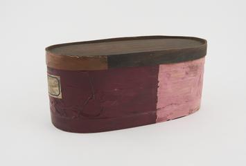 Wooden herb box covered with coloured paper