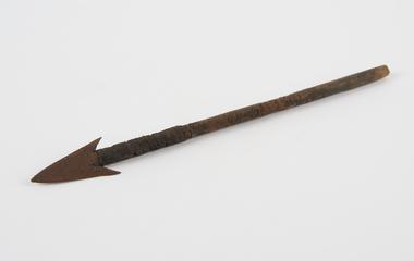 Arrowhead, wooden shaft bound with leather strap