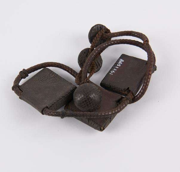 Amuletic necklace consisting of three leather cases