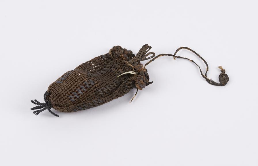 Piece of amber in a net bag, worn to avert cramp