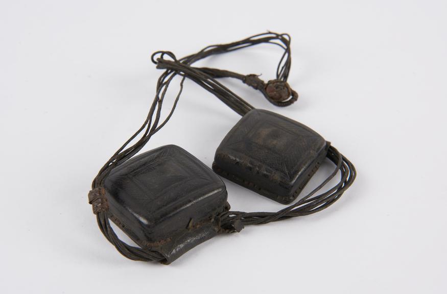 Necklace consisting of two square cases