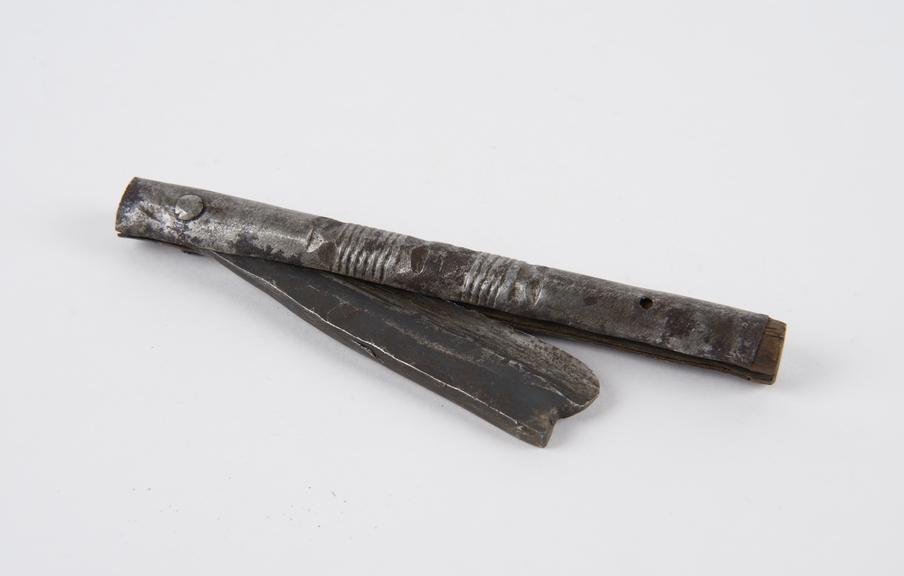 Folding razor, steel and wood, African, 1850-1925