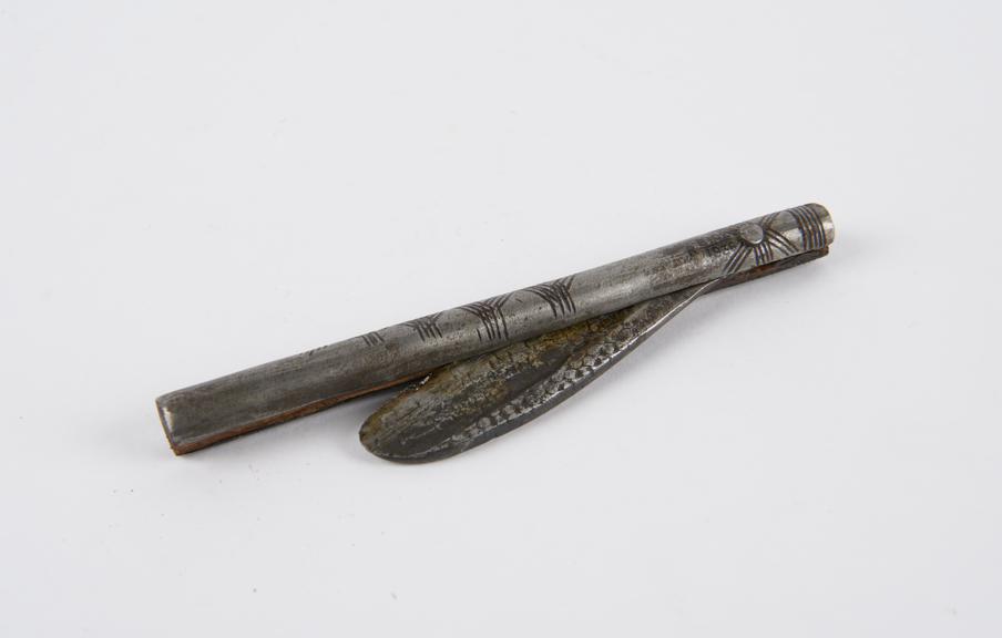 Folding razor, steel and wood, African, 1850-1925