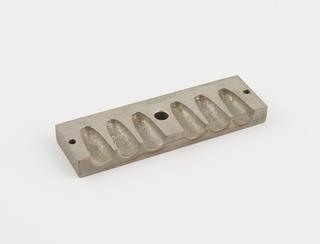 Part of suppository mould, for six suppositories