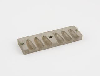 Part of suppository mould, for six suppositories
