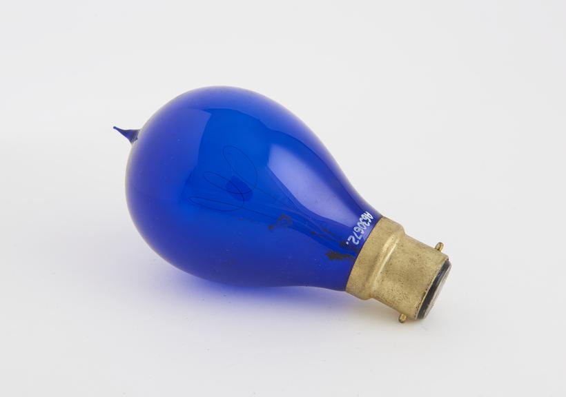 Dark blue glass carbon filament lamp with a bayonet fitting