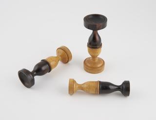 Three double ended compressors for squeezing sides of cachets together