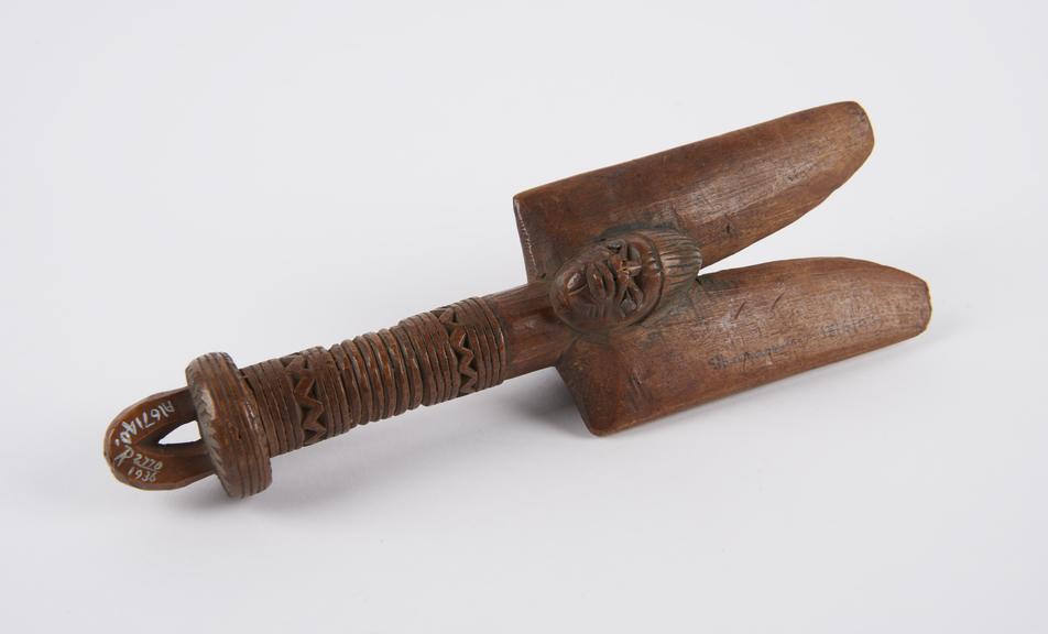 Wooden shango staff, carved with 2 large painted wings