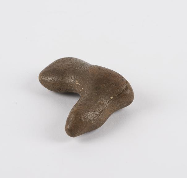 Flint shaped like leg with foot, amuletic