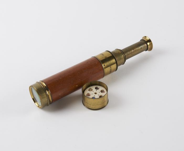 combined microscope-telescope with brass cap containing two