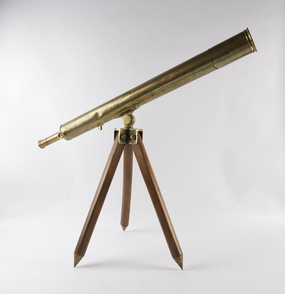 refracting terrestrial telescope , brass, with folding tripod