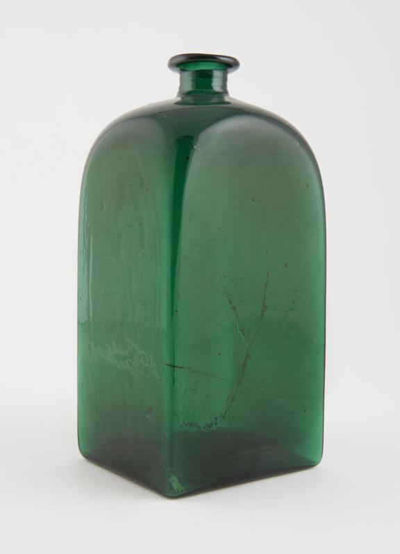 Square pharmacy bottle, green glass, probably English, 1801-1850