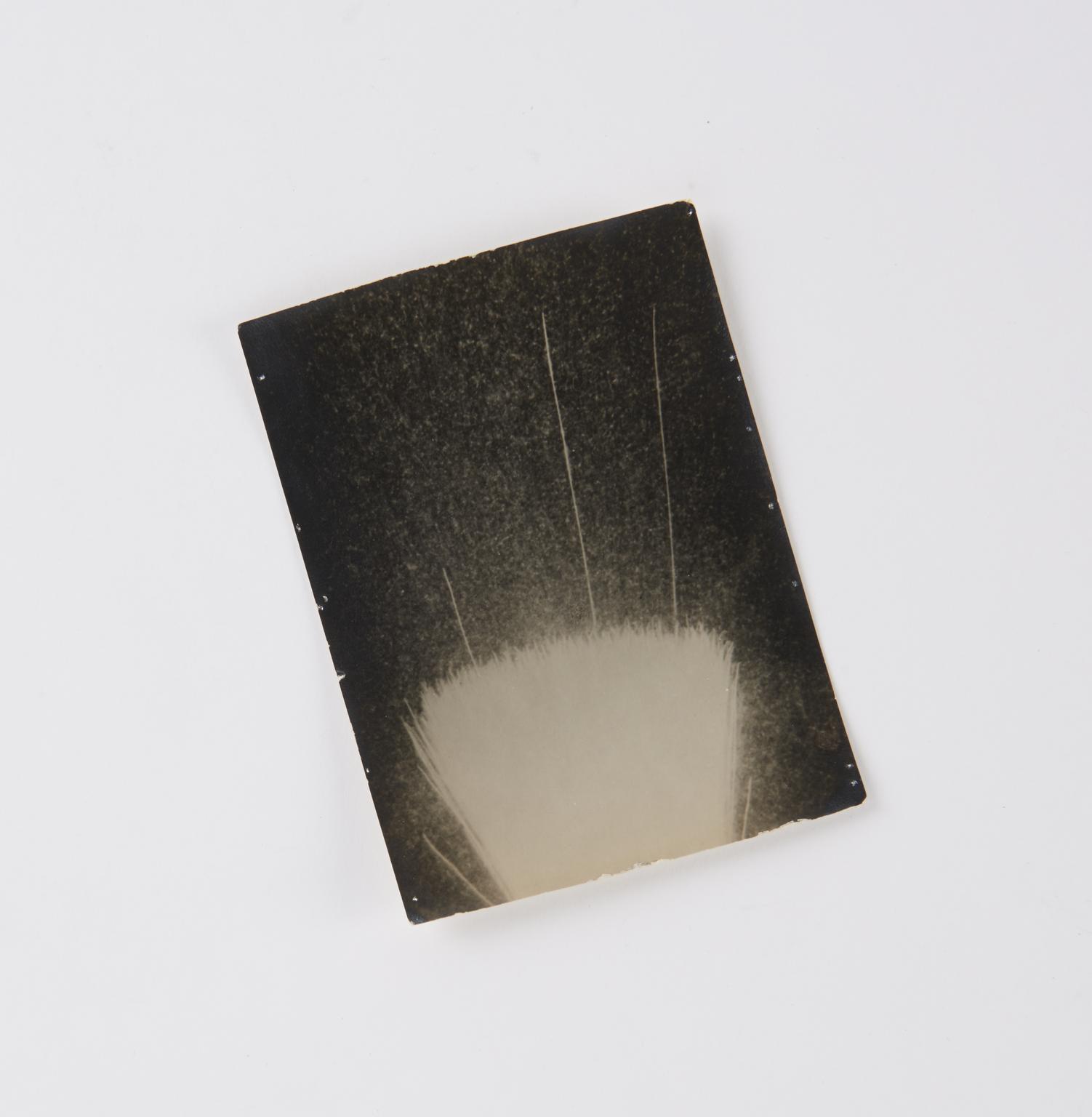 Black and white photographic print showing long-range alpha-rays from ...