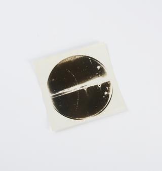 Photographic print, showing a 63 million volt positron passing through a 6 mm. lead plate and emerging as a 23 million volt positron