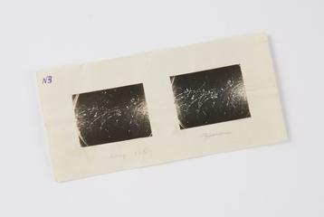 Stereoscopic pair of black and white photographic prints, mounted on paper, marked 'N3', showing recoil electrons produced in air by the gamma-rays from radium C