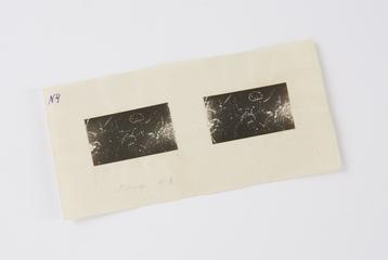 Stereoscopic pair of black and white photographic prints, mounted on paper, marked 'N4', showing recoil electrons produced in air by the gamma-rays from radium C