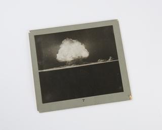 Black and white photographic print, 7th of 8, showing the July 1945 New Mexico atomic bomb explosion test