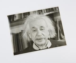 Black and white photographic print (1of 29) of diagram, titled ‘Professor Einstein’, from still taken from the animated film, ‘Atomic Physics'