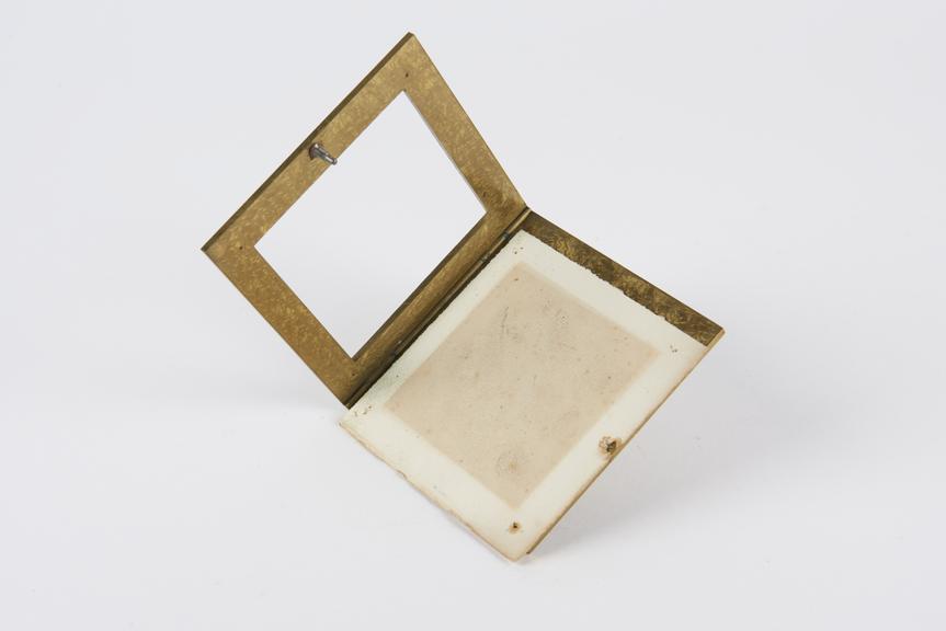 Square brass frame with a flange nut