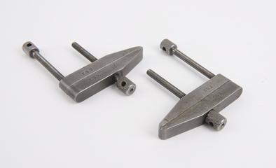 A pair of 2" high tensile toolmakers 'clamps.