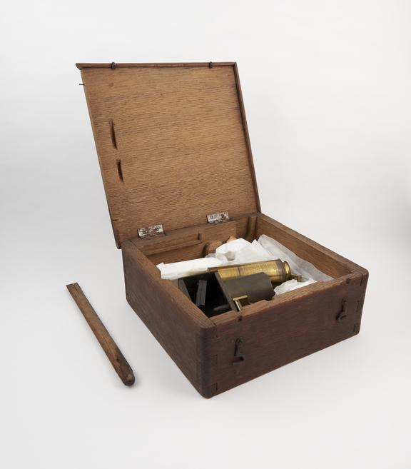 Oak box containing miscellaneous selection of microscope parts