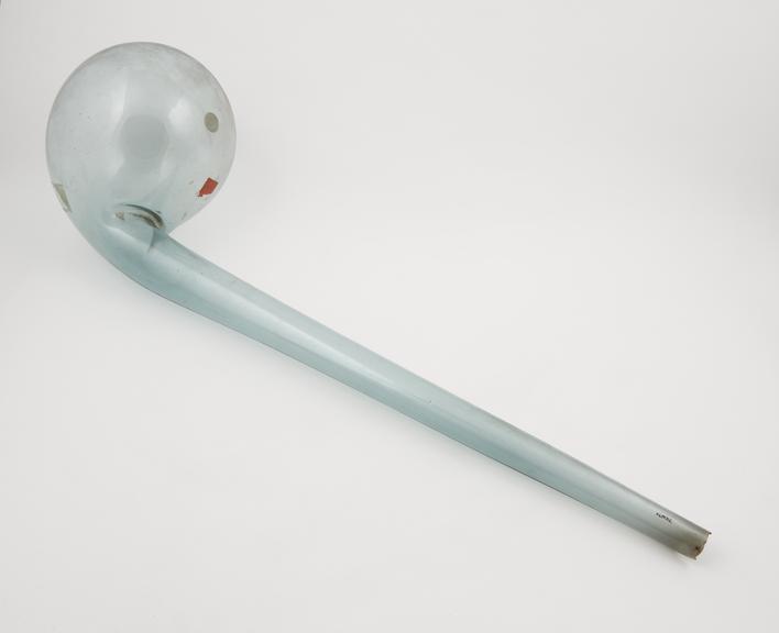 Pale green glass retort, swan necked, spherical flask