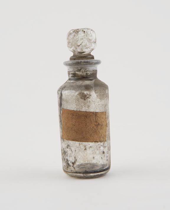 Small bottle, clear glass, trace content, English, 1840-1900