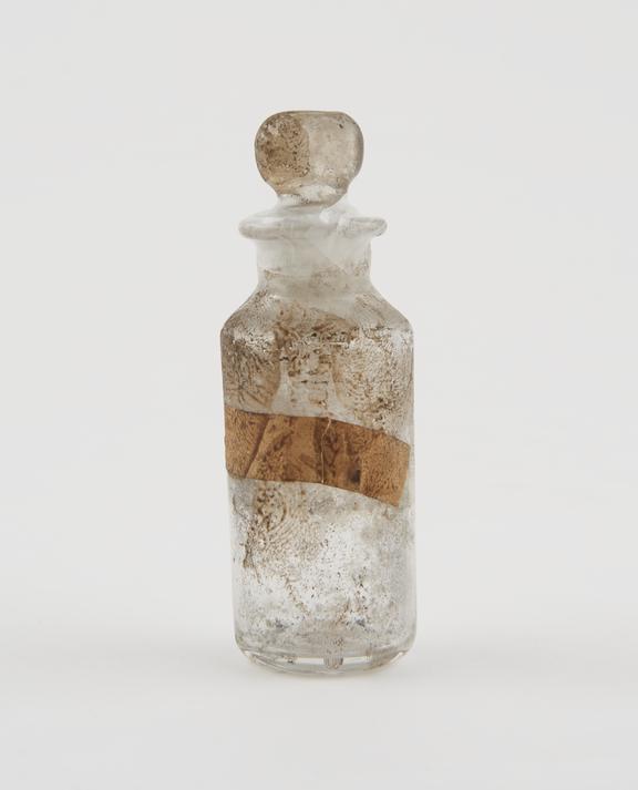 Small bottle, clear glass, trace content, English, 1840-1900