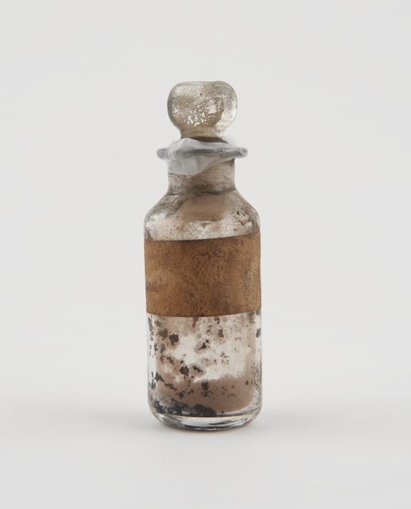 Small bottle, clear glass, trace content, English, 1840-1900