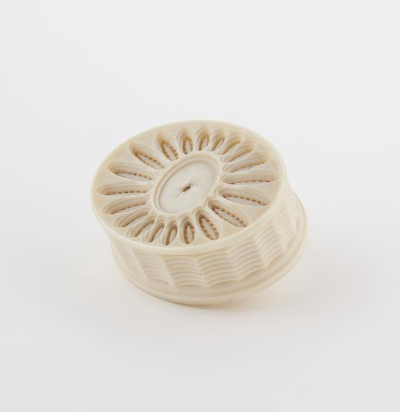 One small ivory box, oval, ornamentally turned