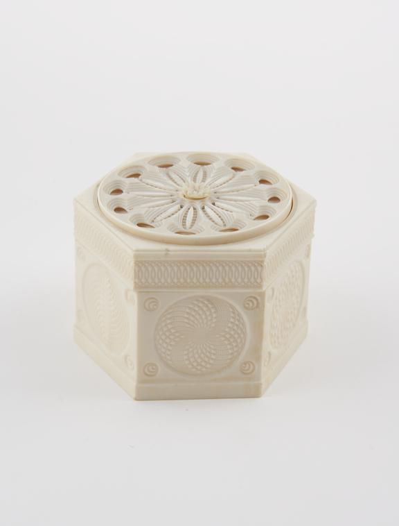 One ivory box, hexagon, ornamentally turned