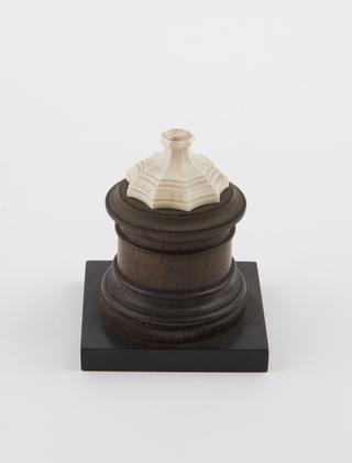 Ivory vase on blackwood pedestal