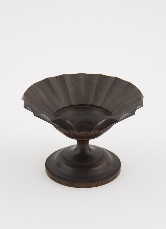 One blackwood shallow vase (on pedestal, wide mouth)