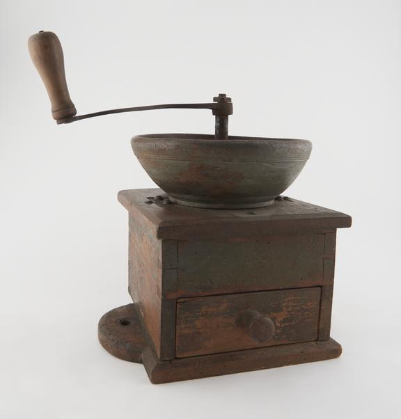 Herb or spice-mill, wooden base with front-opening drawer