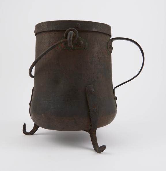 Large copper cauldron bound with iron