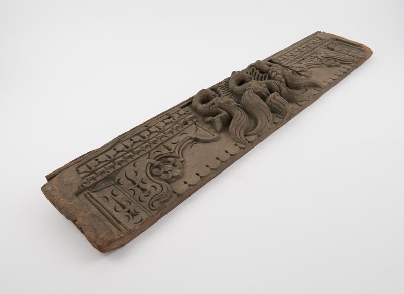 Carved wooden panel, probably from a pharmacy, European