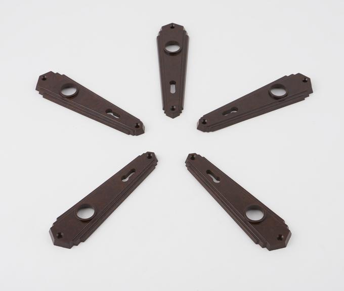 Five tapered door handle fixings made of phenol formaldehyde