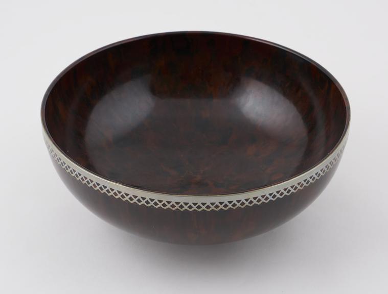 Bowl made of dark brown/black/light brown phenol formaldehyde