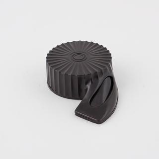 Circular shell-like object made of phenol formaldehyde