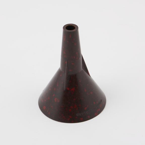 Reddish mottled drinks funnel made of phenol formaldehyde