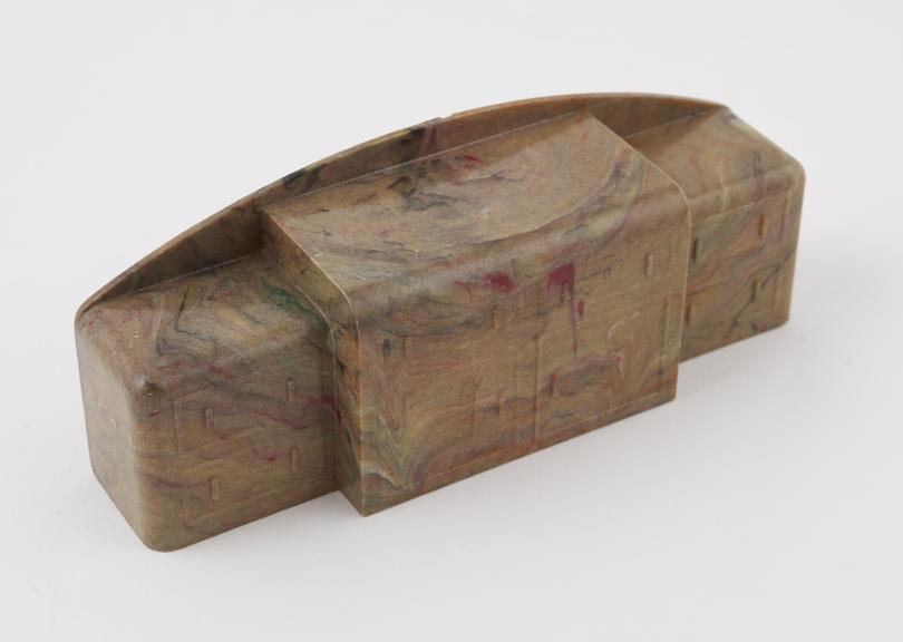 Light brown mottled model, or toy