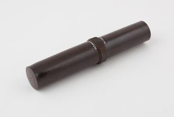 Reddish-brown, cylindrical tube